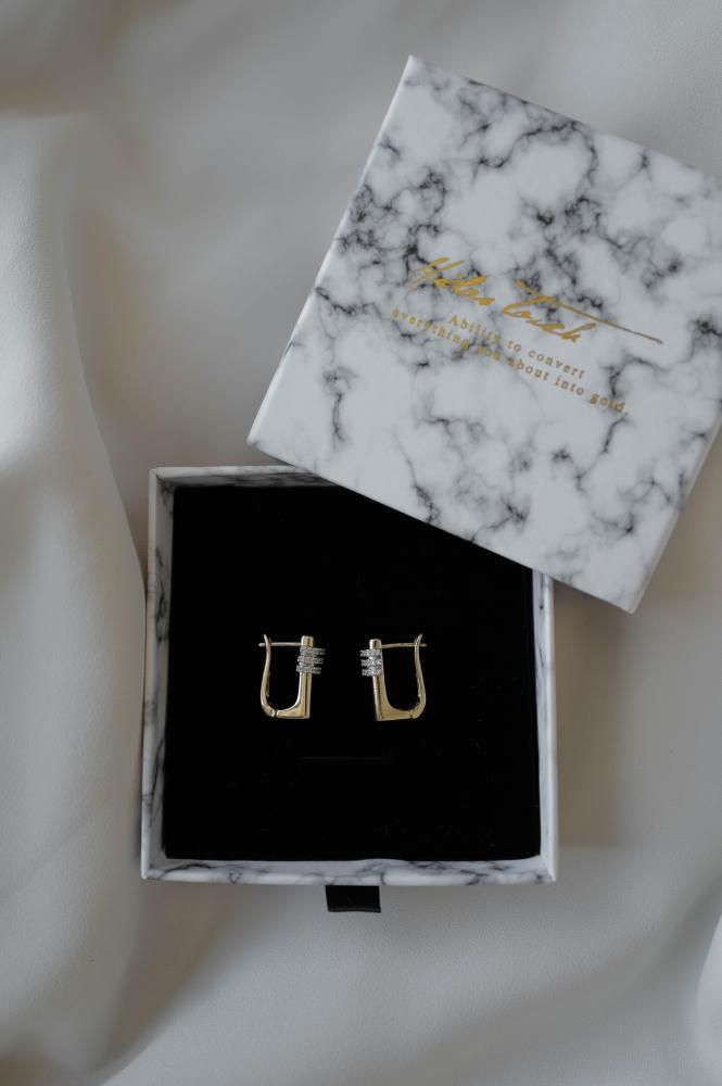 MIDASTOUCH<br>CZニュアンススクエアピアス